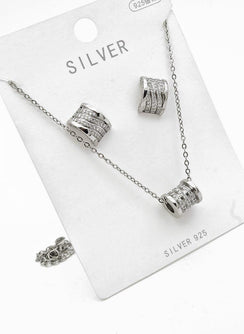 Set cadena+dije+aretes rollito