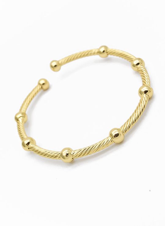 Pulsera tipo brazalete con balines